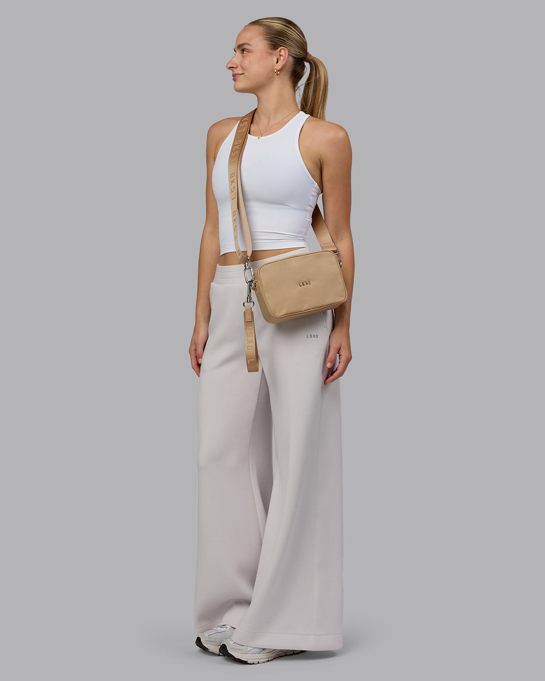 Woman wearing Go-To Shoulder Bag - Oat Milk - view 10