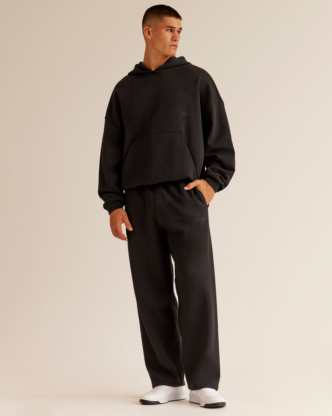 Man wearing AfterDark ZeroCrease Straight Leg Pant - Black | Model:Jackson | Size:L - view 5
