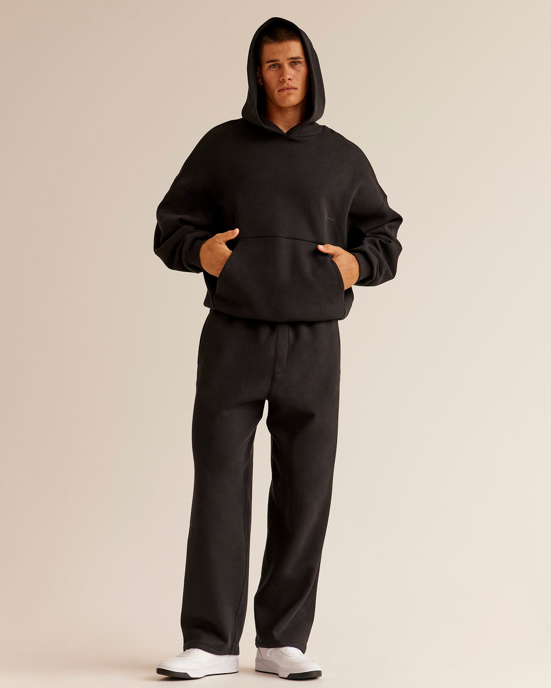 Man wearing AfterDark ZeroCrease Straight Leg Pant - Black | Model:Jackson | Size:L - view 7