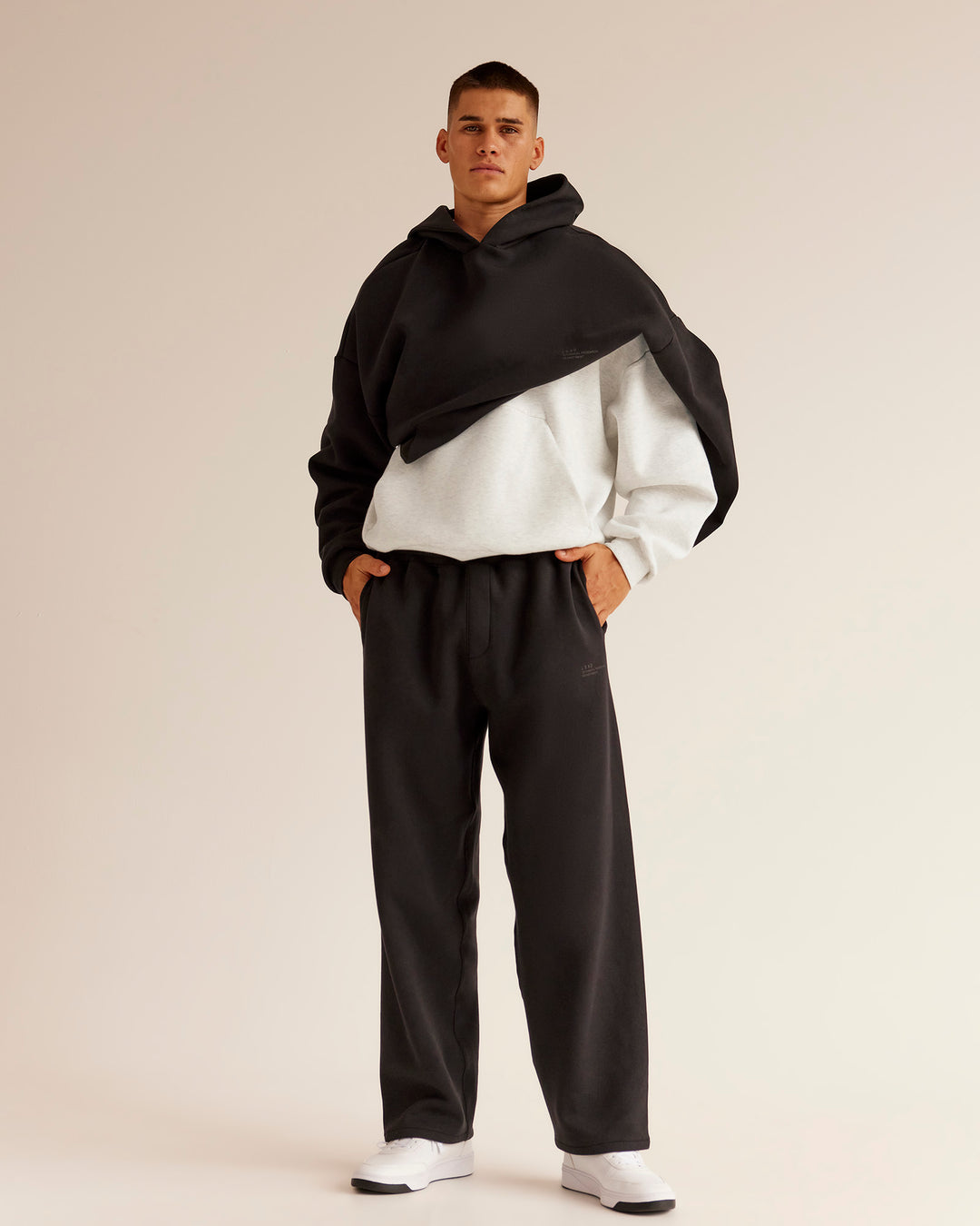 Man wearing AfterDark ZeroCrease Straight Leg Pant - Black | Model:Jackson | Size:L - view 8