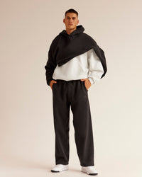 Man wearing AfterDark ZeroCrease Straight Leg Pant - Black | Model:Jackson | Size:L | Thumbnail Index: 7