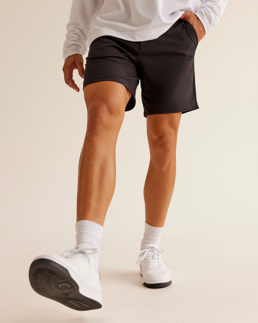 Man wearing All Day ZeroCrease™ Regular 8" Short - Black | Model:Jackson | Size:34 - view 5