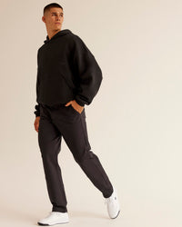 Man wearing All Day ZeroCrease™  Regular Pant - Black | Model:Jackson | Size:34 | Thumbnail Index: 5