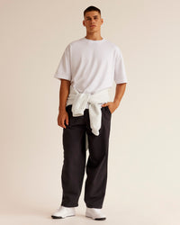 Man wearing All Day ZeroCrease™ Wide Leg Pant - Black | Model:Jackson | Size:34 | Thumbnail Index: 1