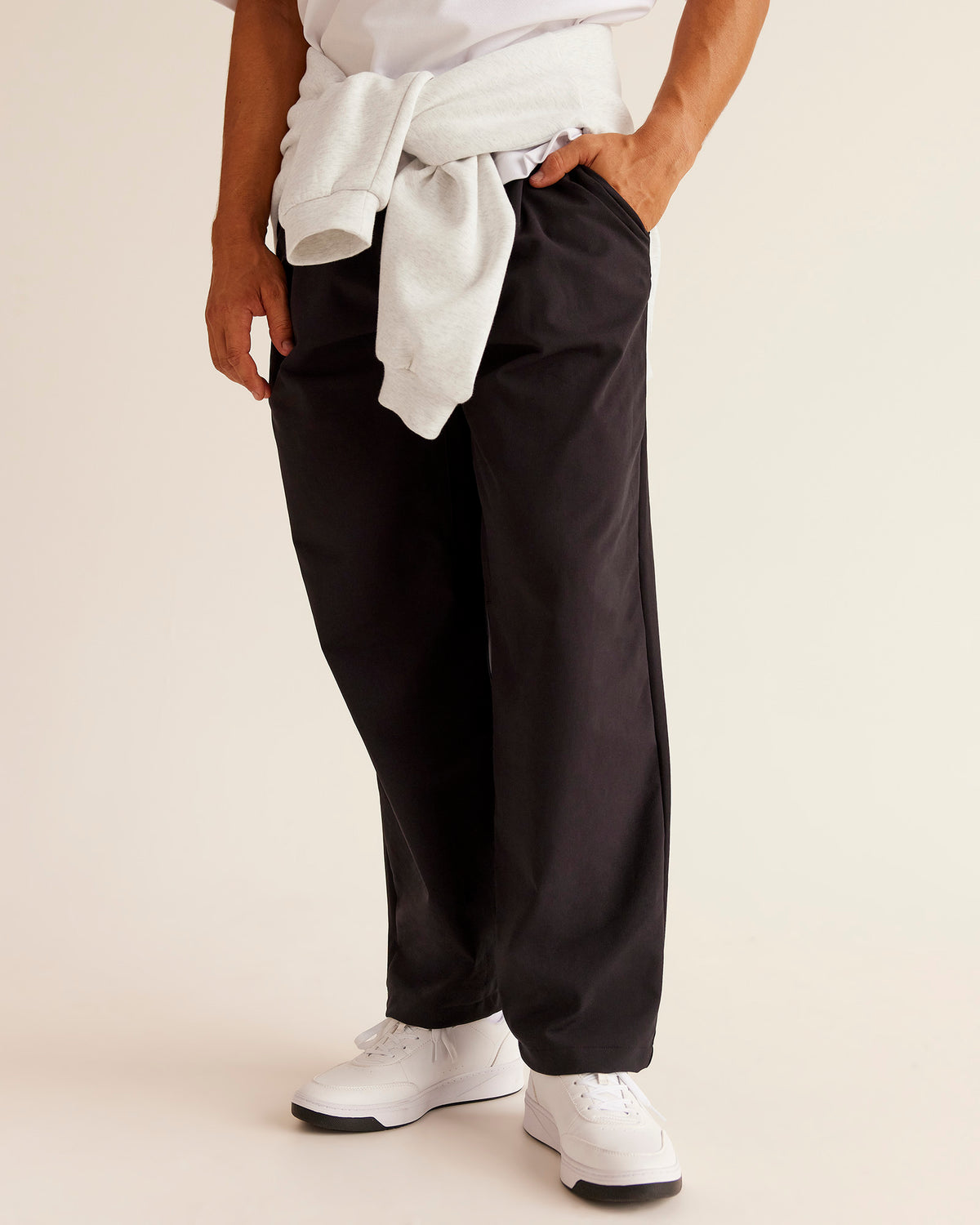 Man wearing All Day ZeroCrease™ Wide Leg Pant - Black | Model:Jackson | Size:34