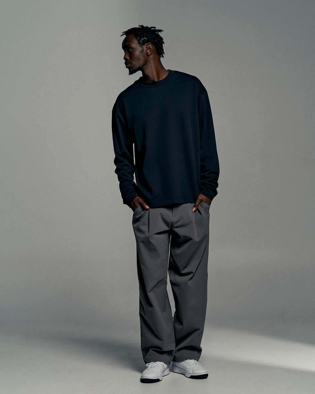 Man wearing All Day ZeroCrease™ Wide Leg Pant - Dark Storm | Model:Okello | Size:L - view 2