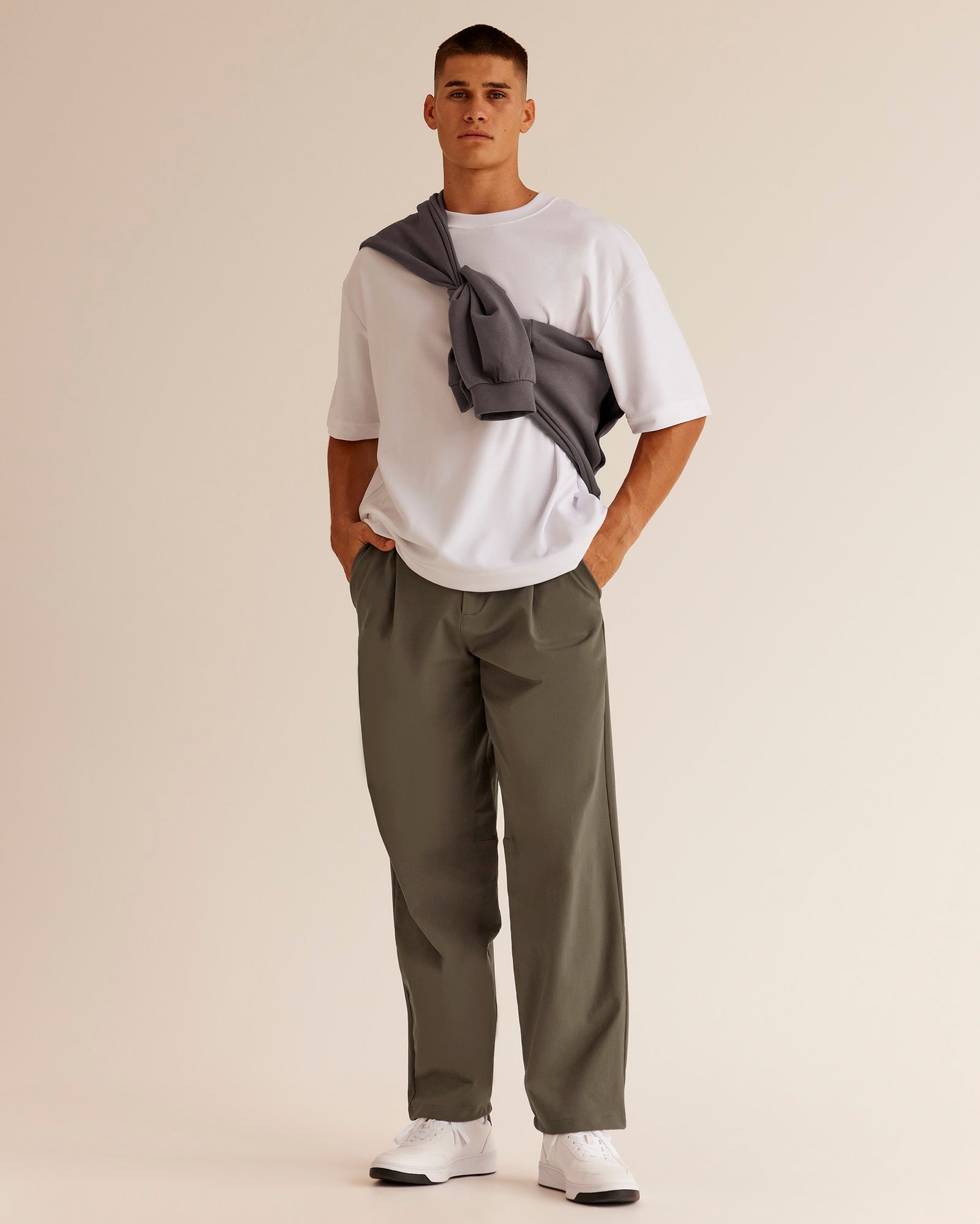 Man wearing All Day ZeroCrease™ Wide Leg Pant - Walnut Grey | Model:Jackson | Size:L