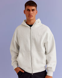 Man wearing Base Zip Through Oversized Hoodie - Silver Marl | Model:Jackson | Size:L | Thumbnail Index: 0