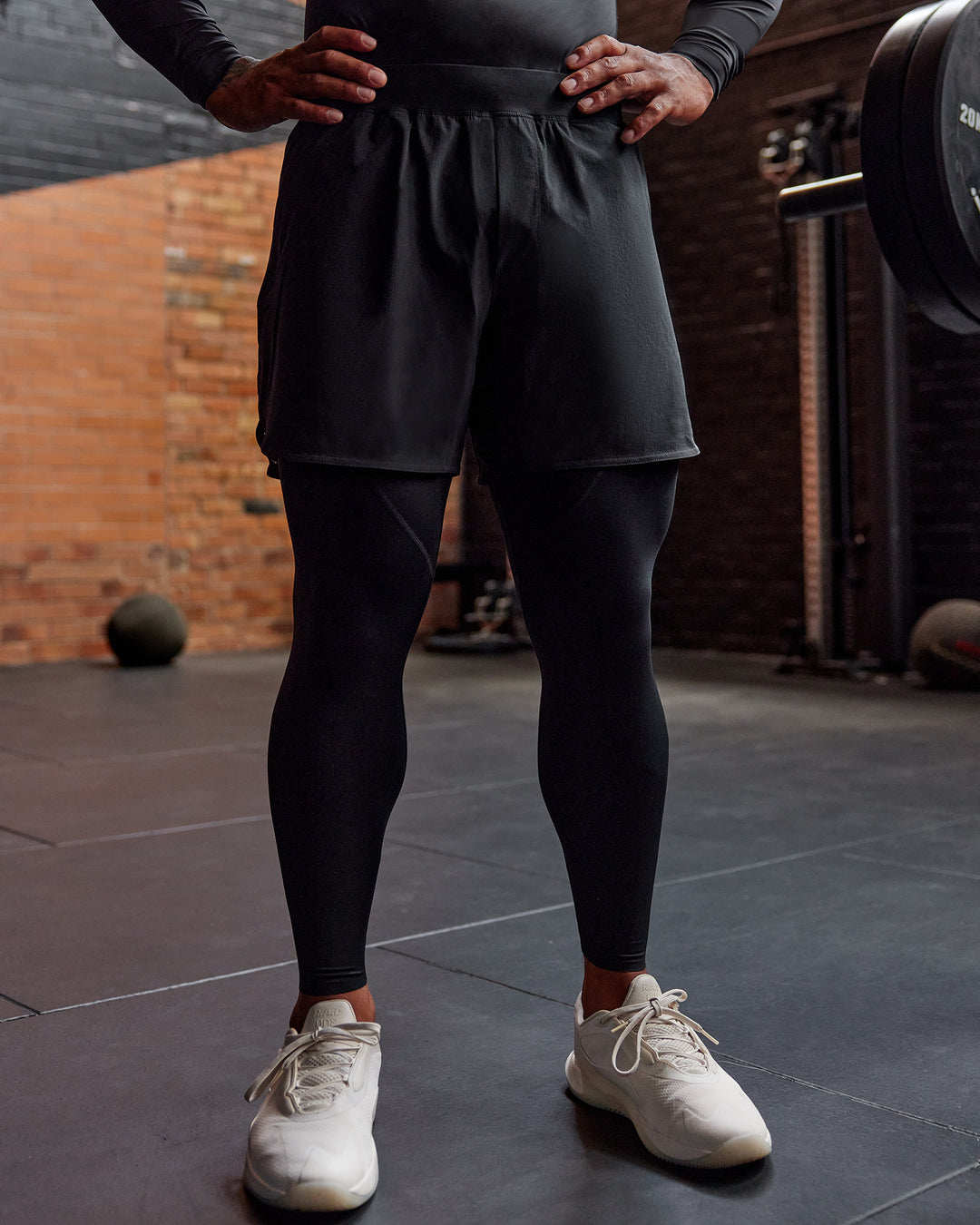 Man wearing BaseTech 26" Leggings - Black | Model:Paris | Size:L - view 3
