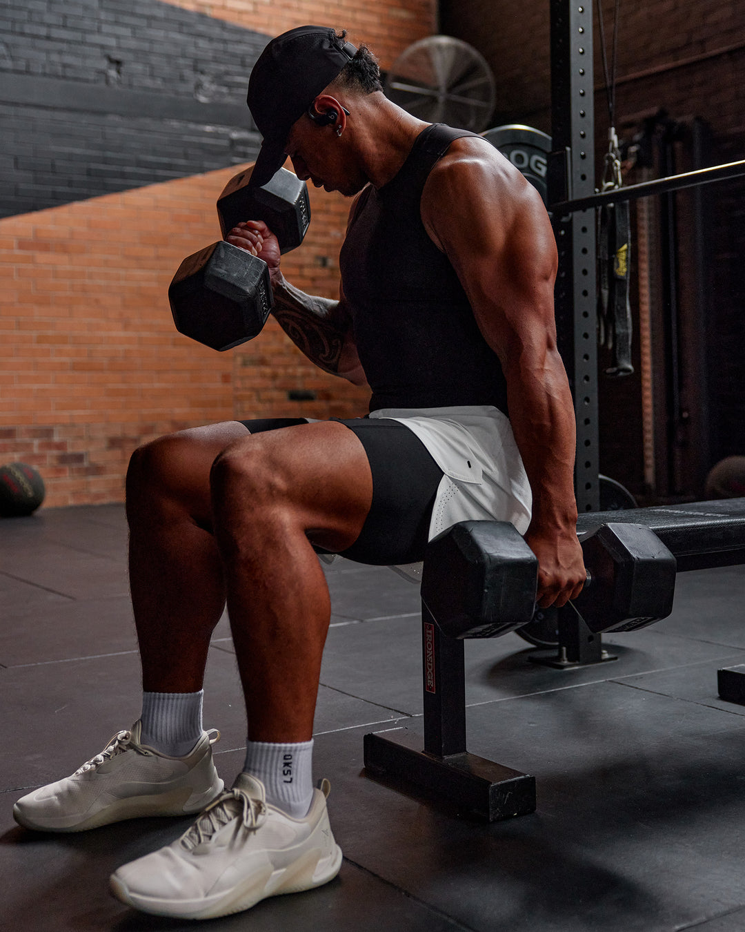 Man wearing BaseTech 8" Shorts - Black | Model:Paris | Size:L - view 4