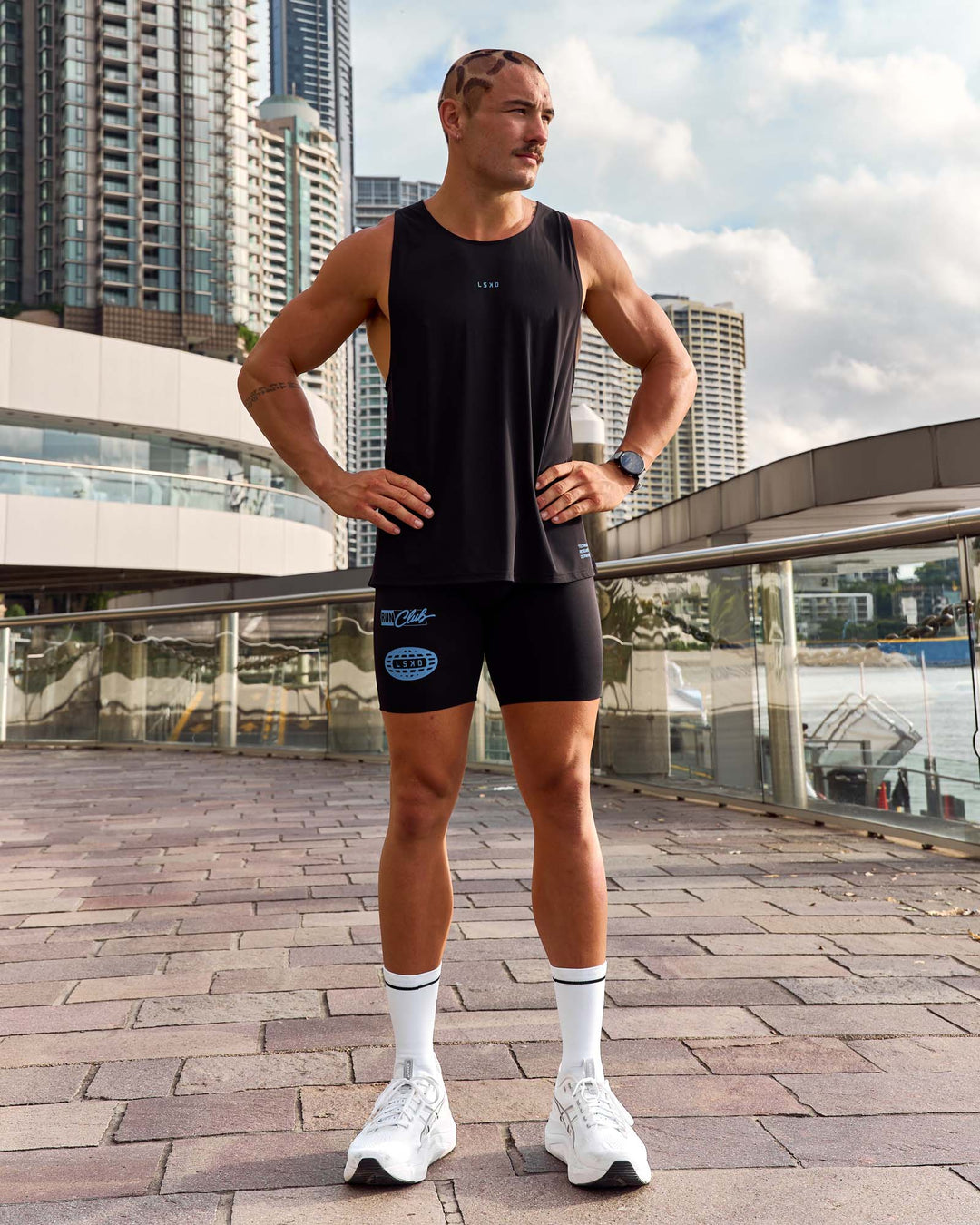 Man wearing Cadence Run Club Script Values Tank - Black-Palace Blue | Model:Cooper | Size:L - view 3