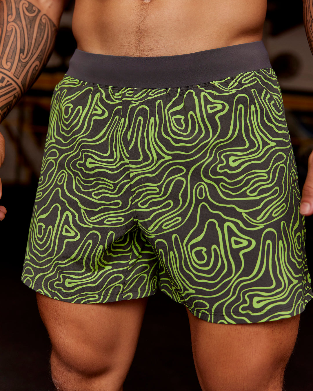 Man wearing Functional Training 5" Short - Friction Print Hyper Green | Model:Hiko | Size:L - view 3