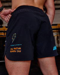Man wearing Lift 6" Short - Black-Blue Atoll | Model:Hiko | Size:L | Thumbnail Index: 0