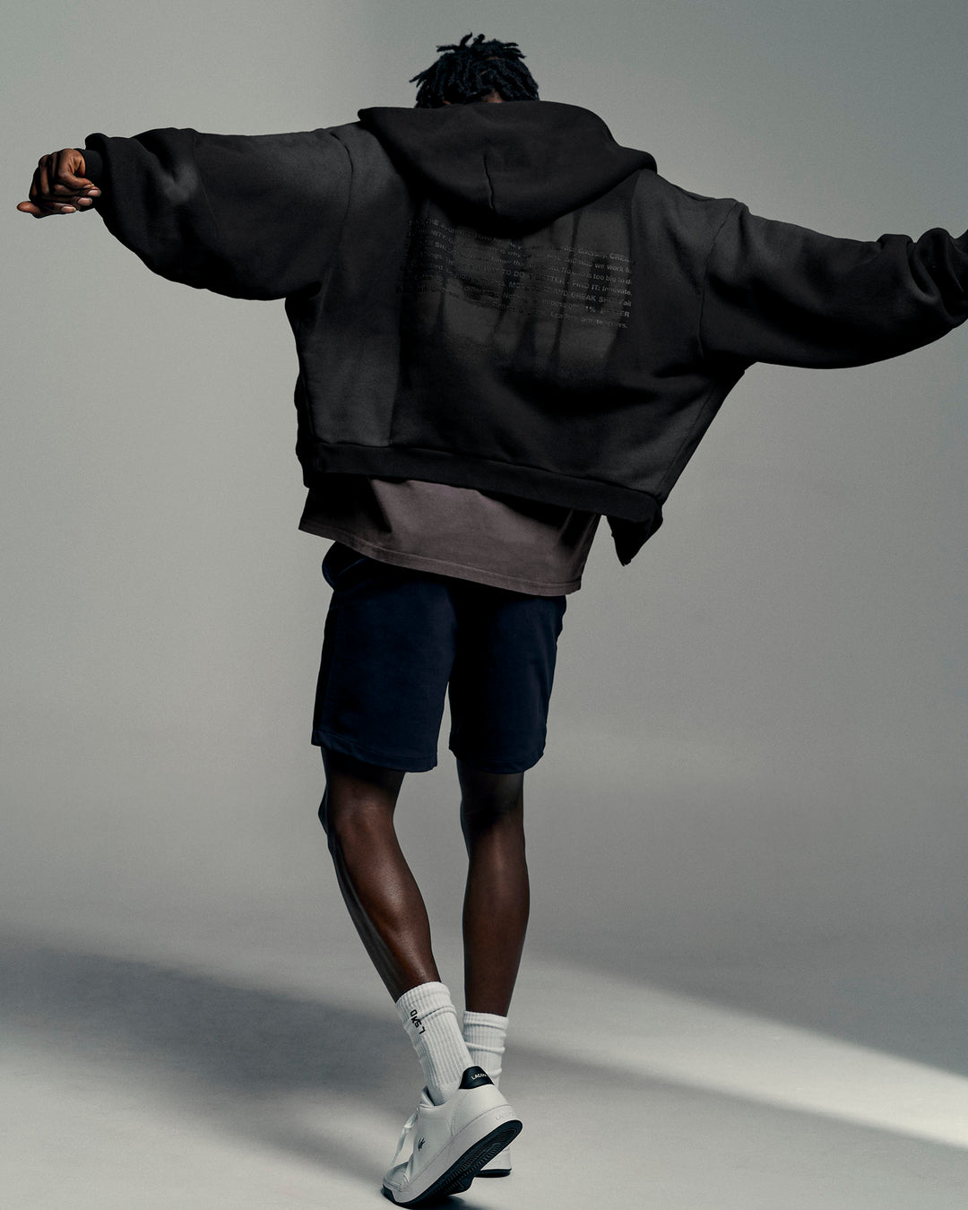 Man wearing Memory in Motion Ultra Heavyweight Zip Thru Hoodie - Black Washed | Model:Okello | Size:L - view 3