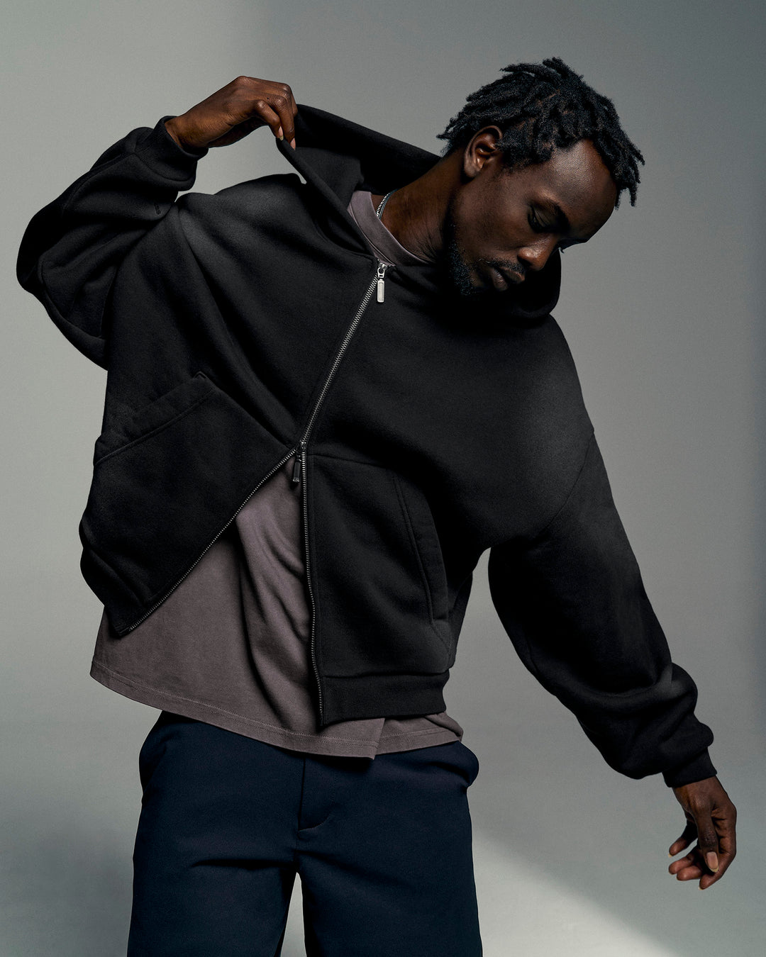 Man wearing Memory in Motion Ultra Heavyweight Zip Thru Hoodie - Black Washed | Model:Okello | Size:L - view 2