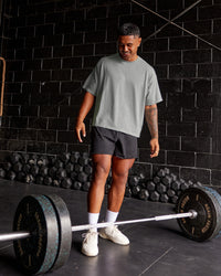 Man wearing Oversized Heavyweight Boxed Tee - Light Grey Marl | Model:Xav | Size:L | Thumbnail Index: 1