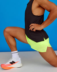 Man wearing Pace 3" Performance Short - Lime Glo | Model:George | Size:L | Thumbnail Index: 2