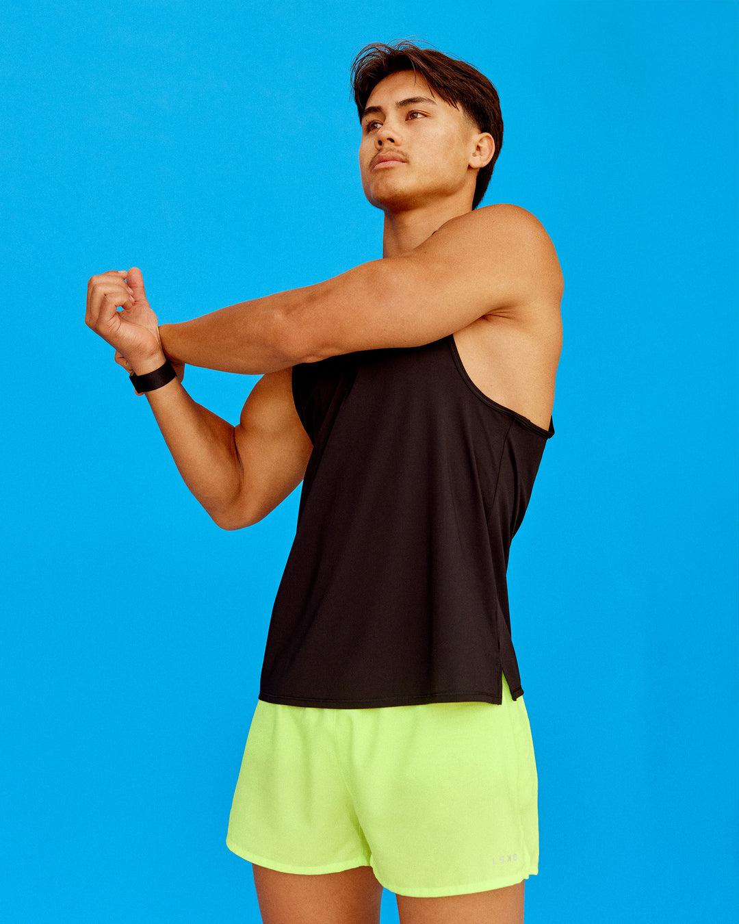 Man wearing Pace 3" Performance Short - Lime Glo | Model:George | Size:L - view 4