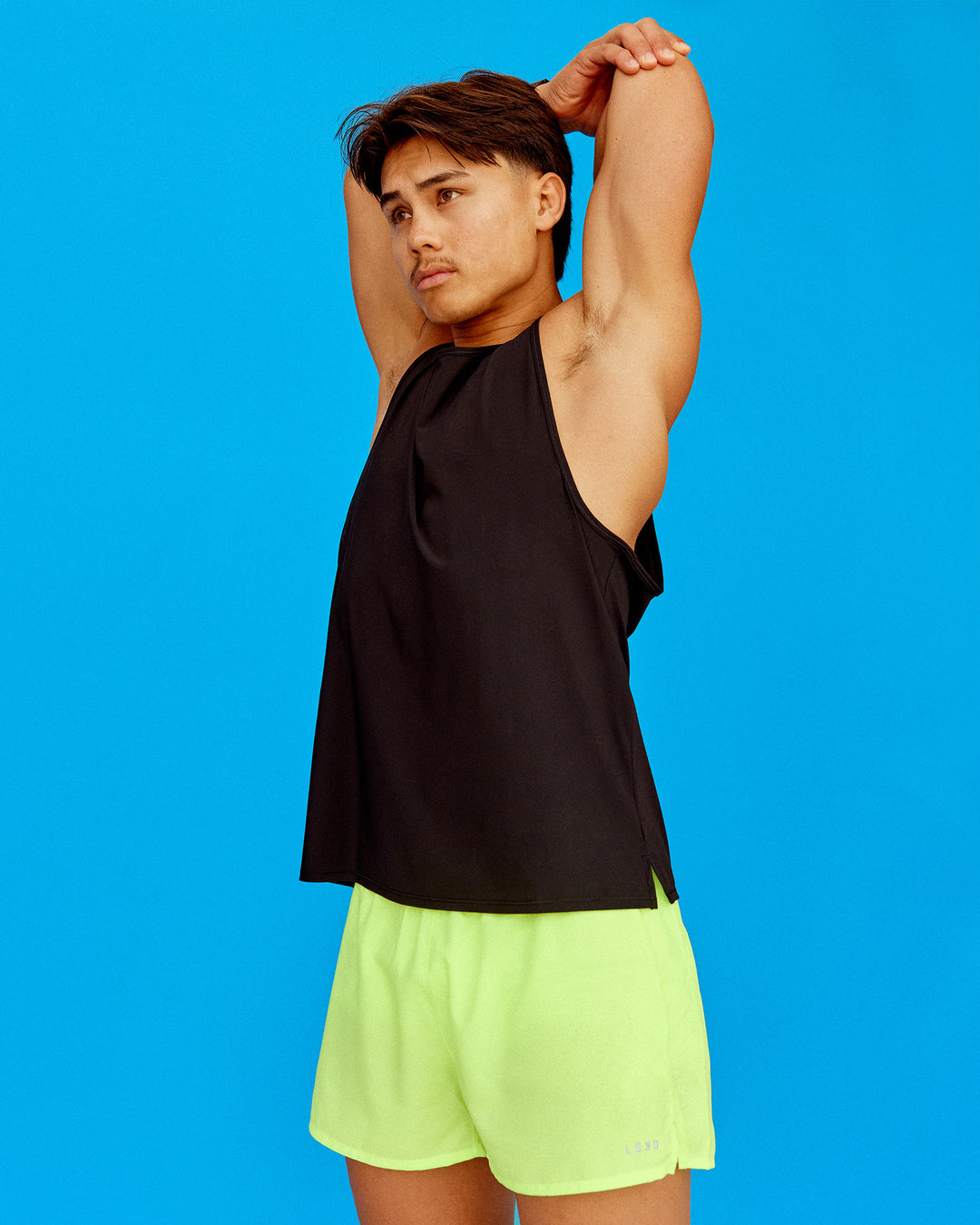 Man wearing Pace 3" Performance Short - Lime Glo | Model:George | Size:L - view 1