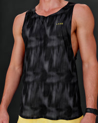 Man wearing Race Day Tank - Lunar Glow-Yellow Fizz | Model:Conor | Size:L | Thumbnail Index: 0
