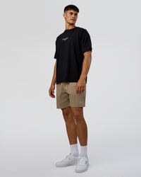 Man wearing 1% Better Every Day EST FLXCotton Oversized Tee - Black | Model:Jackson | Size:L | Thumbnail Index: 6