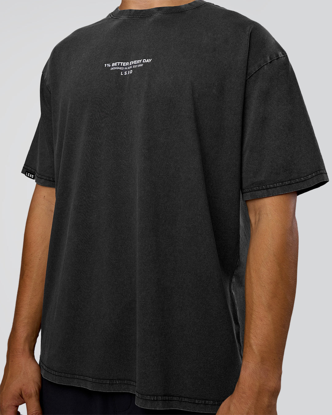 Man wearing 1% Better Every Day EST FLXCotton Oversized Tee - Black Washed | Model:Jackson | Size:L - view 8