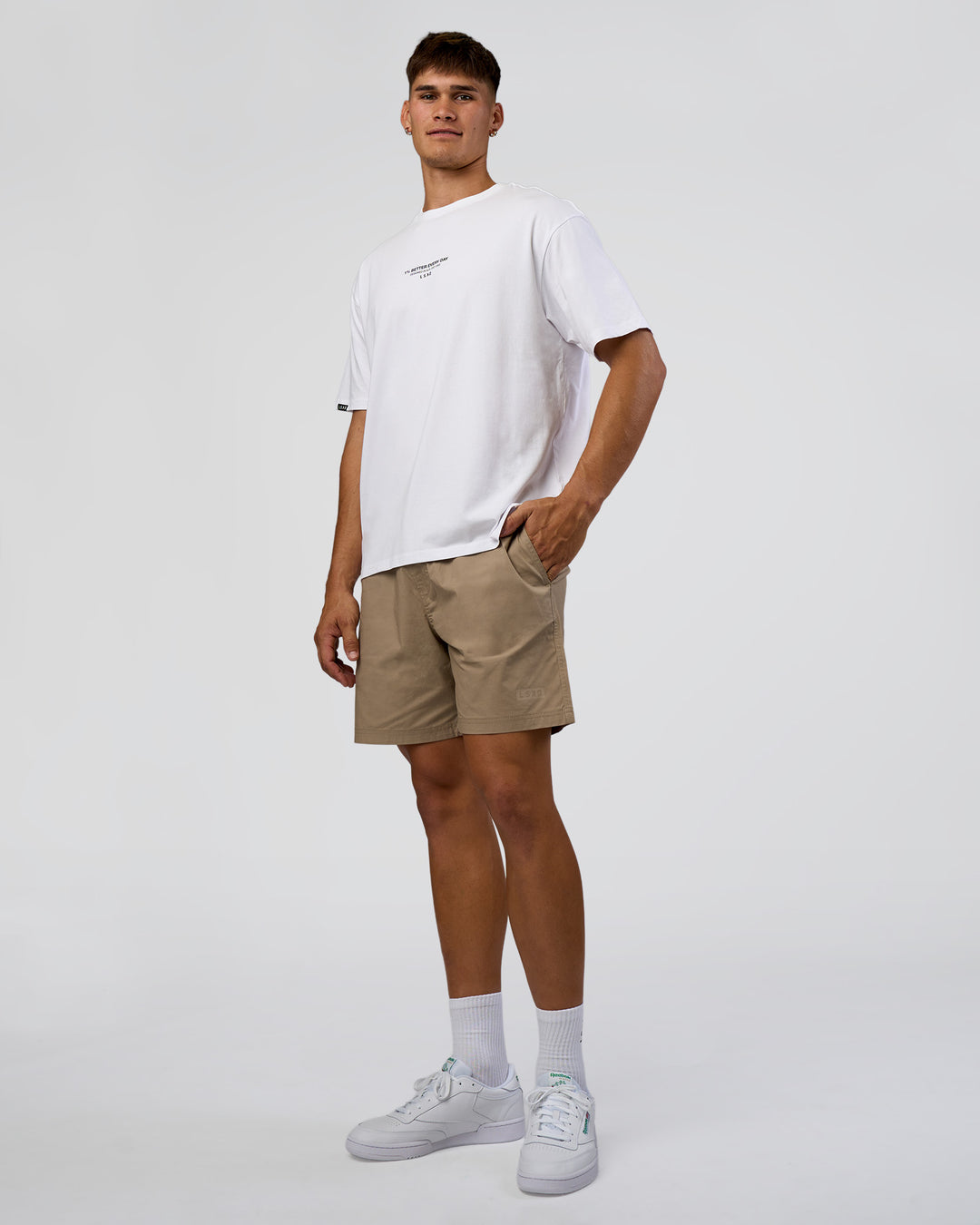 Man wearing 1% Better Every Day EST FLXCotton Oversized Tee - White | Model:Jackson | Size:L - view 3