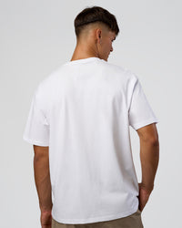 Man wearing 1% Better Every Day EST FLXCotton Oversized Tee - White | Model:Jackson | Size:L | Thumbnail Index: 5