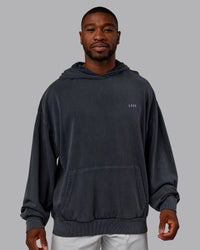 Man wearing 1% Better Value Series Oversized Hoodie - Black-Violet Ray | Model:Sam | Size:L | Thumbnail Index: 2