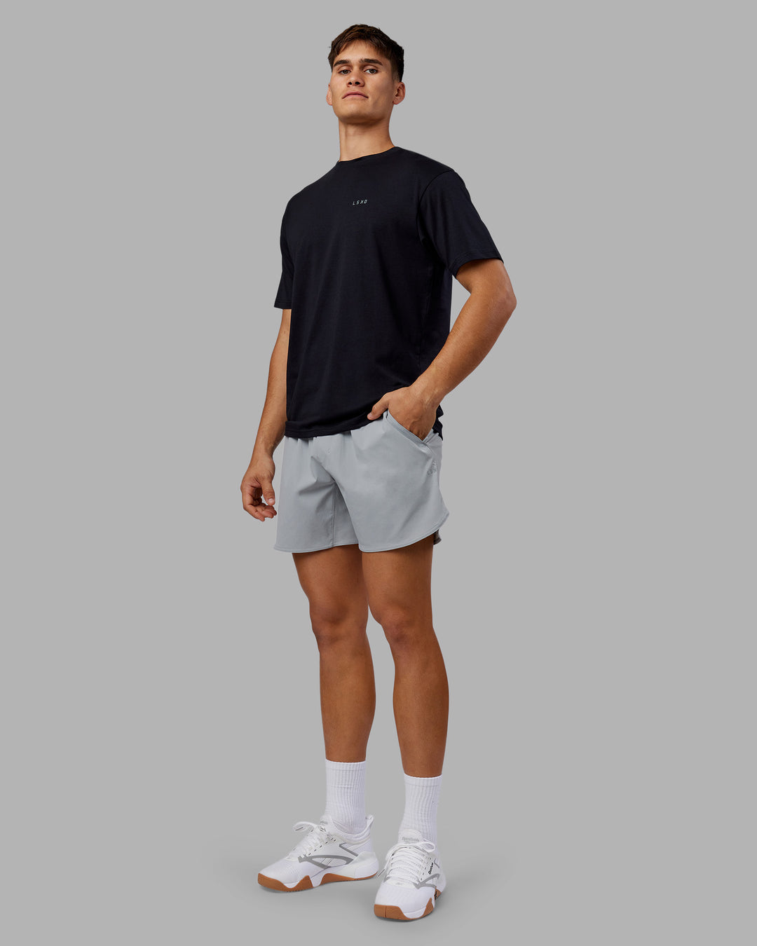 Man wearing 1% Better Value Series FLXCotton Tee Oversize - Black-Black | Model:Jackson | Size:L - view 9