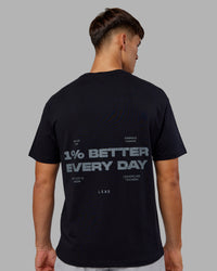 Man wearing 1% Better Value Series FLXCotton Tee Oversize - Black-Black | Model:Jackson | Size:L | Thumbnail Index: 10