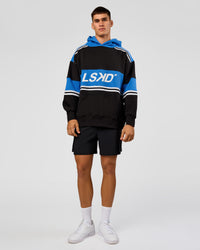 Man wearing A-Team Oversized Hoodie - Caviar-Palace Blue | Model:Jackson | Size:L | Thumbnail Index: 2