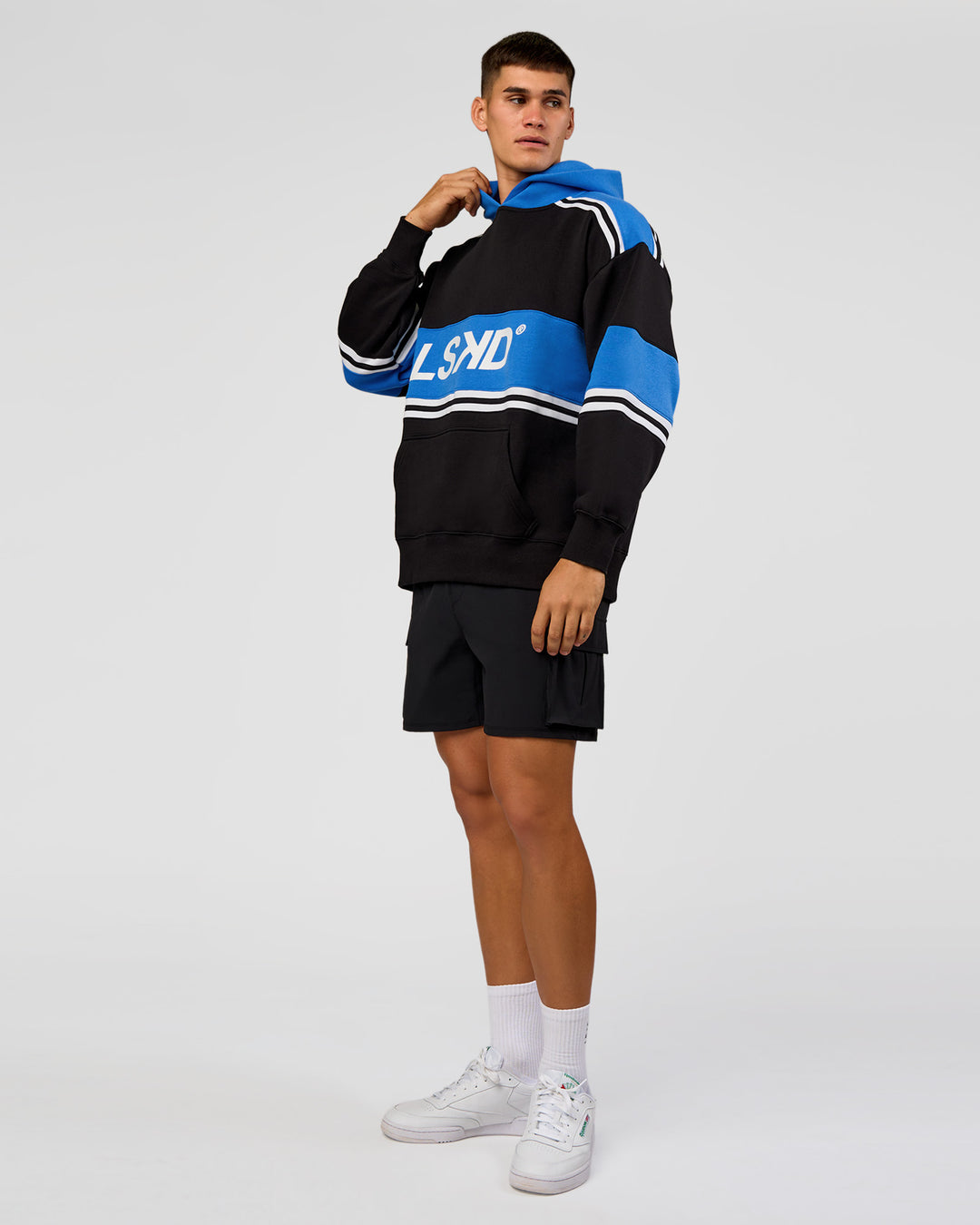 Man wearing A-Team Oversized Hoodie - Caviar-Palace Blue | Model:Jackson | Size:L - view 7