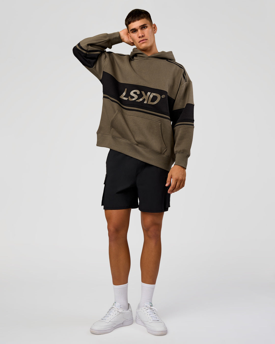 Man wearing A-Team Oversized Hoodie - Walnut Grey-Caviar | Model:Jackson | Size:L - view 3