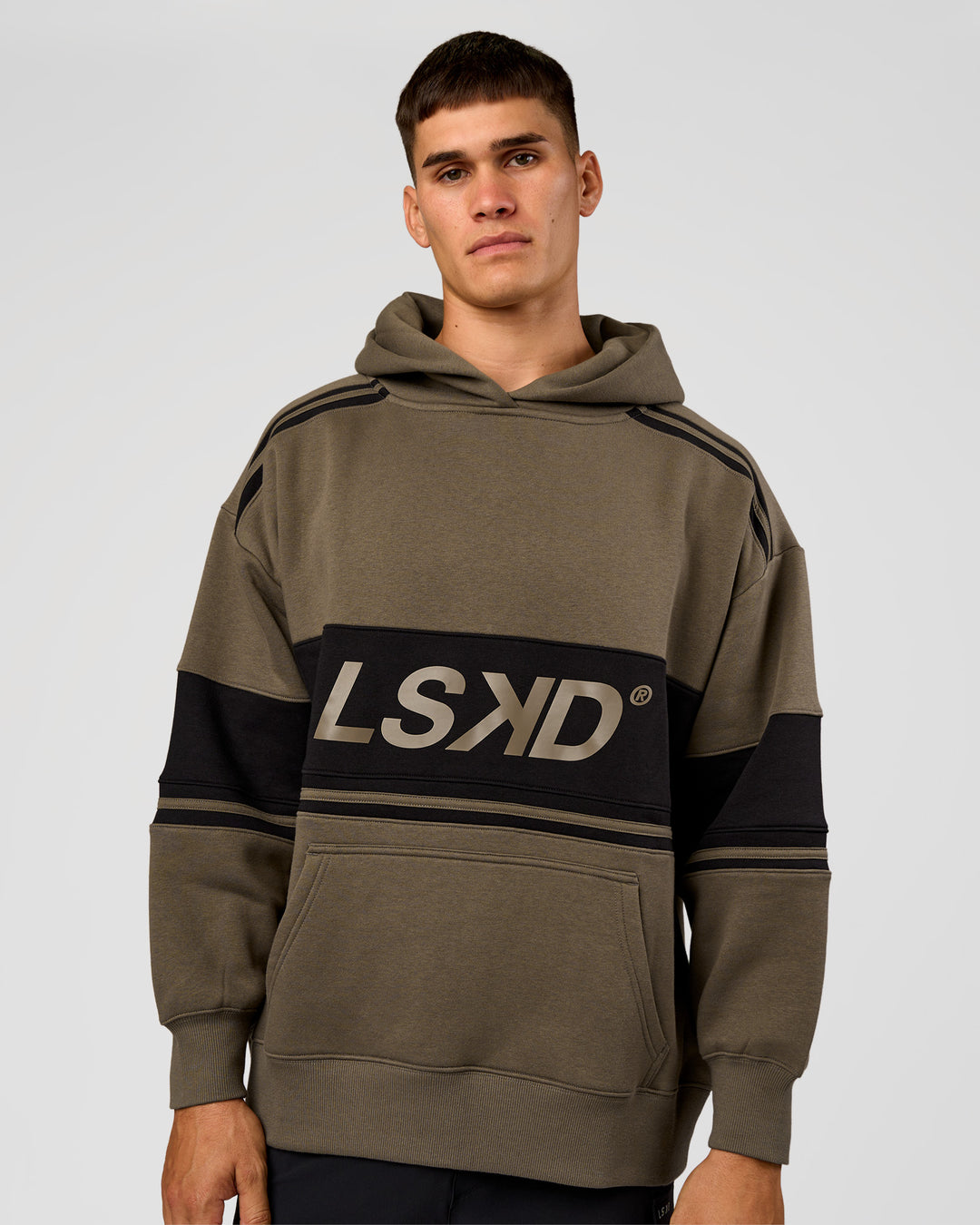 Man wearing A-Team Oversized Hoodie - Walnut Grey-Caviar | Model:Jackson | Size:L - view 2