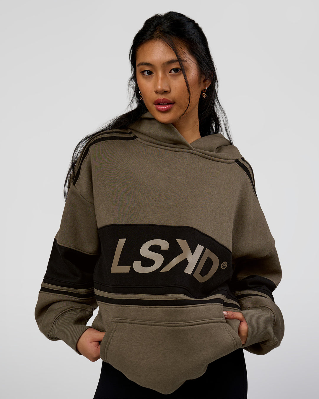 Woman wearing 
A-Team Oversized Hoodie - Walnut Grey-Caviar | Model:Loren | Size:L - view 6