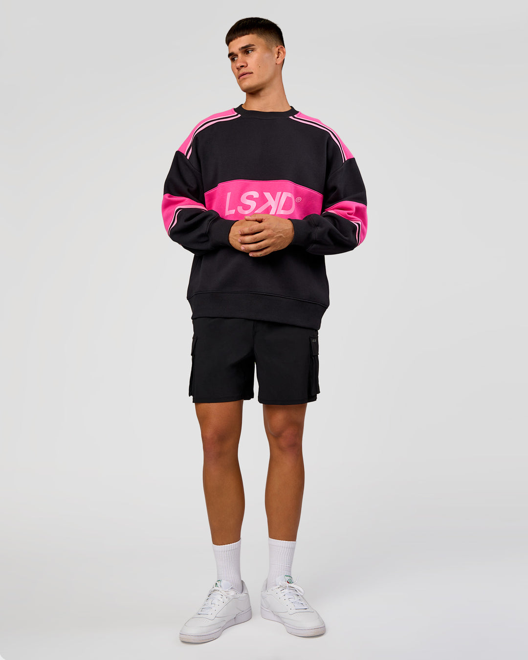 Man wearing A-Team Sweater Oversize - Caviar-Ultra Pink-Candy Pink | Model:Jackson | Size:L - view 10