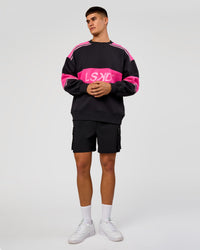 Man wearing A-Team Sweater Oversize - Caviar-Ultra Pink-Candy Pink | Model:Jackson | Size:L | Thumbnail Index: 9