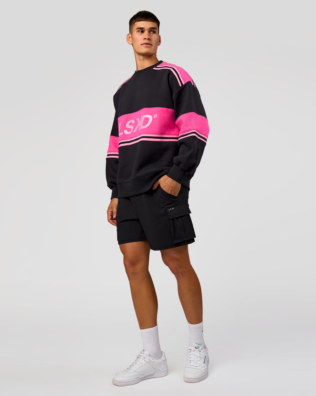 Man wearing A-Team Sweater Oversize - Caviar-Ultra Pink-Candy Pink | Model:Jackson | Size:L - view 5