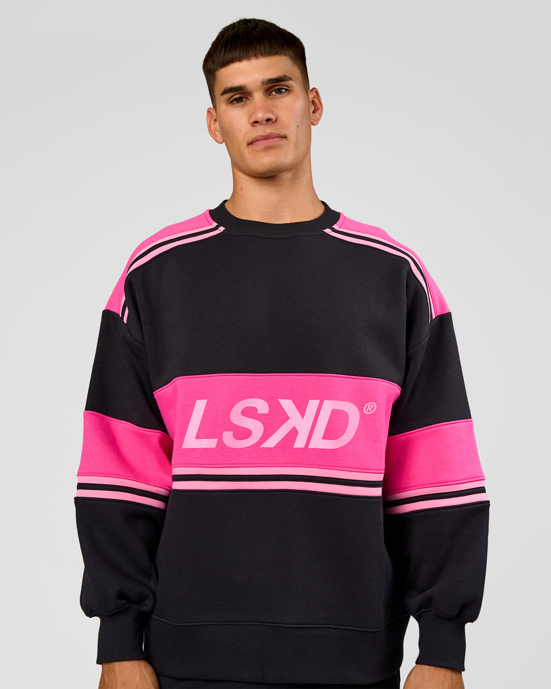 Man wearing A-Team Sweater Oversize - Caviar-Ultra Pink-Candy Pink | Model:Jackson | Size:L - view 4
