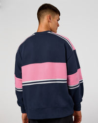 Man wearing A-Team Sweater Oversize - Future Navy-Candy Pink | Model:Jackson | Size:L | Thumbnail Index: 5