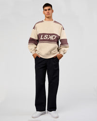 Man wearing A-Team Sweater Oversize - Shale Beige-Cocoa Powder | Model:Jackson | Size:L  | Thumbnail Index: 8