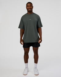 Man wearing Abstract Haze FLXCotton Tee - Carbon Green-Cantaloupe | Model:Sam | Size:L | Thumbnail Index: 9