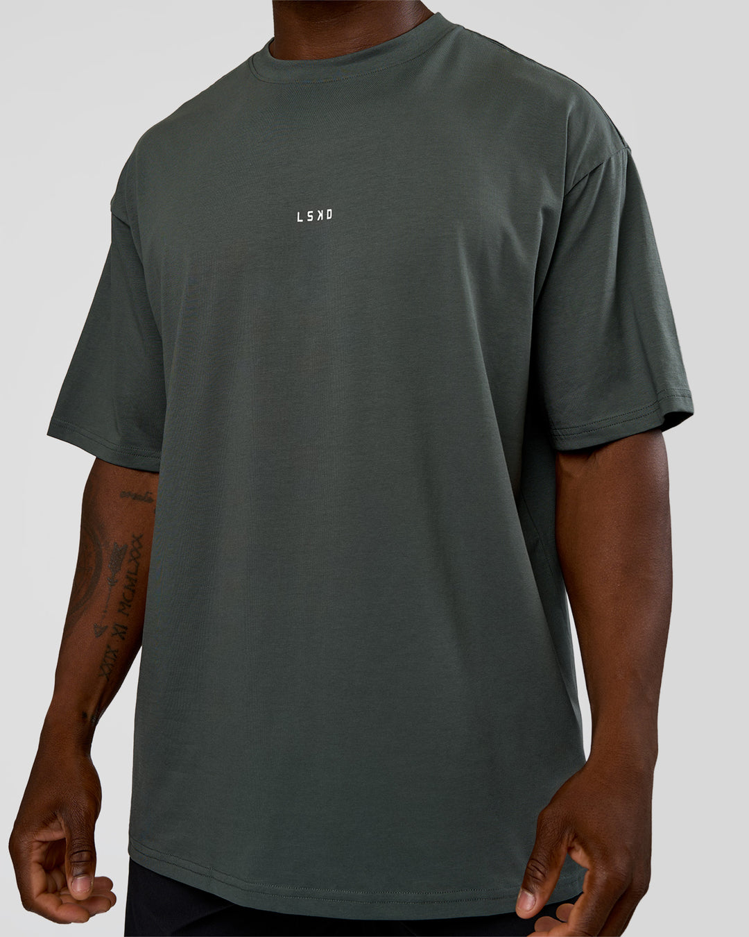 Man wearing Abstract Haze FLXCotton Tee - Carbon Green-Cantaloupe | Model:Sam | Size:L - view 7