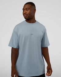 Man wearing Abstract Haze FLXCotton Tee - Dusty Blue-Black | Model:Sam | Size:L | Thumbnail Index: 1