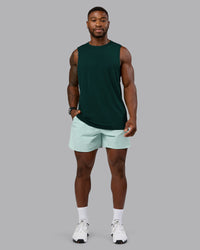 Man wearing AeroFLX+ Seamless Muscle Tank - Dark Moss/Dark Moss Marl | Model:Sam | Size:L | Thumbnail Index: 4