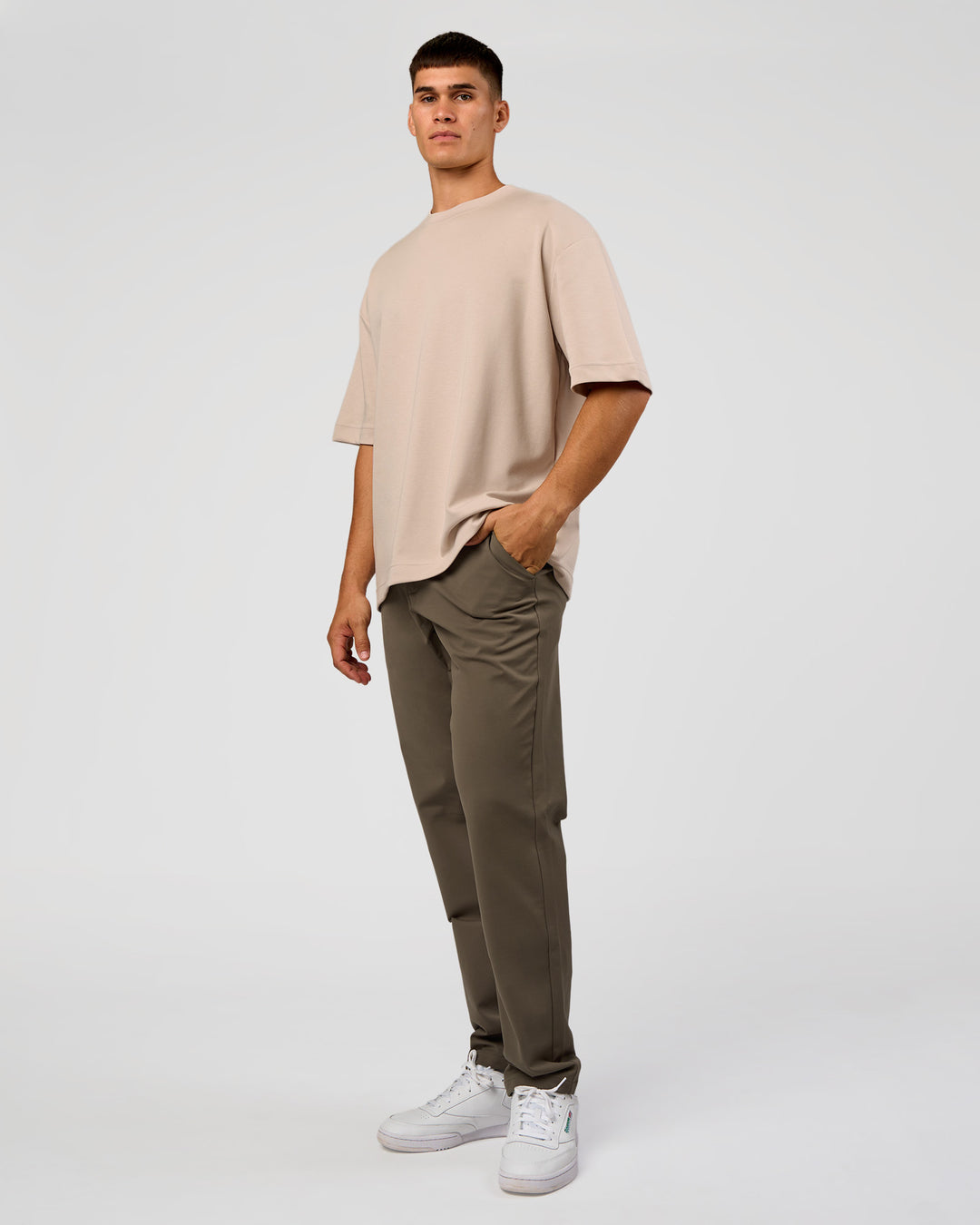 Man wearing AfterDark ZeroCrease Oversized Tee - Shale Beige | Model:Jackson | Size:L - view 3
