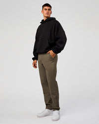 Man wearing AfterDark ZeroCrease Oversized Hoodie - Black | Model:Jackson | Size:L | Thumbnail Index: 6