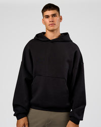Man wearing AfterDark ZeroCrease Oversized Hoodie - Black | Model:Jackson | Size:L | Thumbnail Index: 9