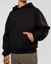Man wearing AfterDark ZeroCrease Oversized Hoodie - Black | Model:Jackson | Size:L | Thumbnail Index: 10